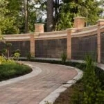 Clean landscaped walkway and lawn after tree service Tampa